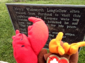 Marley and Longfellow at the lighthouse, learning  bit of trivia about Henry Wadsworth Longfellow. 